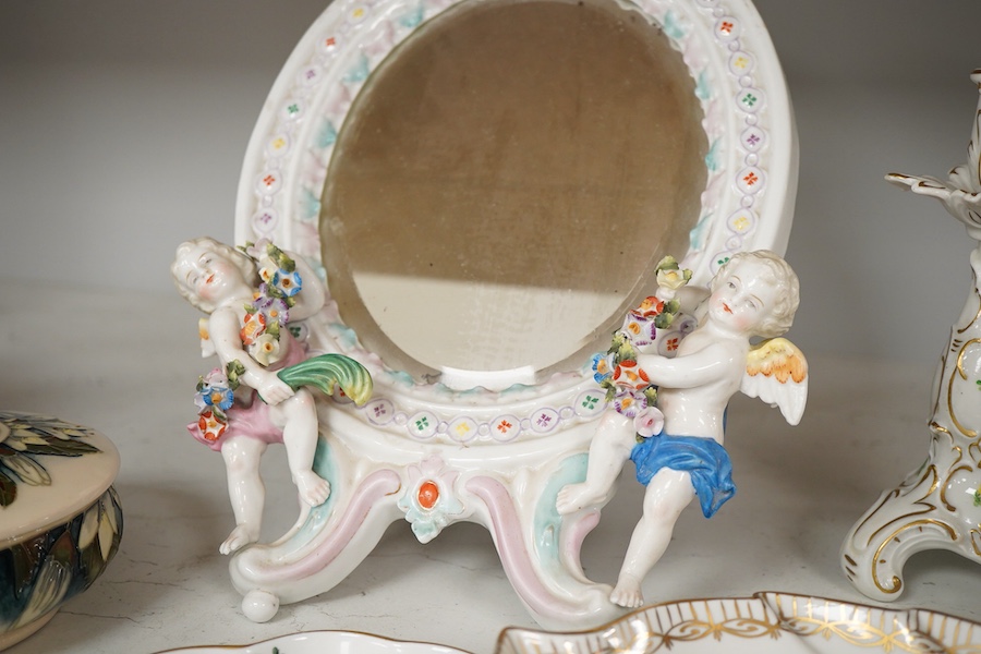 A Dresden style mirror, a Moorcroft pot, Doulton flambé vase and other ceramics, tallest 30cm